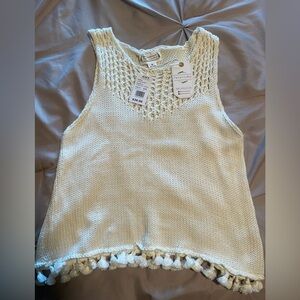 Loveriche womens ivory knit top with pom poms. NWT Glick’s